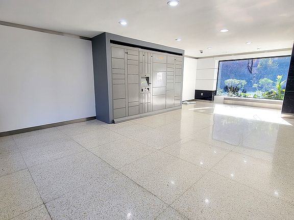 3rd image of 65-50 Wetherole St #2U