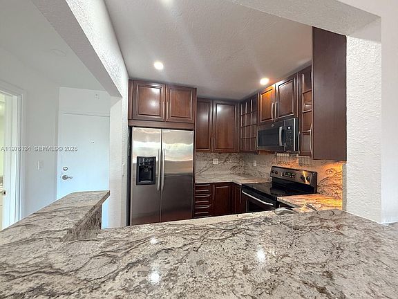 5th image of 2640 NE 135th St APT 305