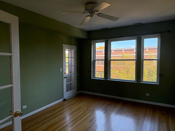 Facing east towards the front balcony door. Great morning light.