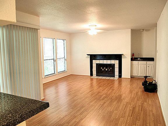 Light and bright living room with new laminate flooring.