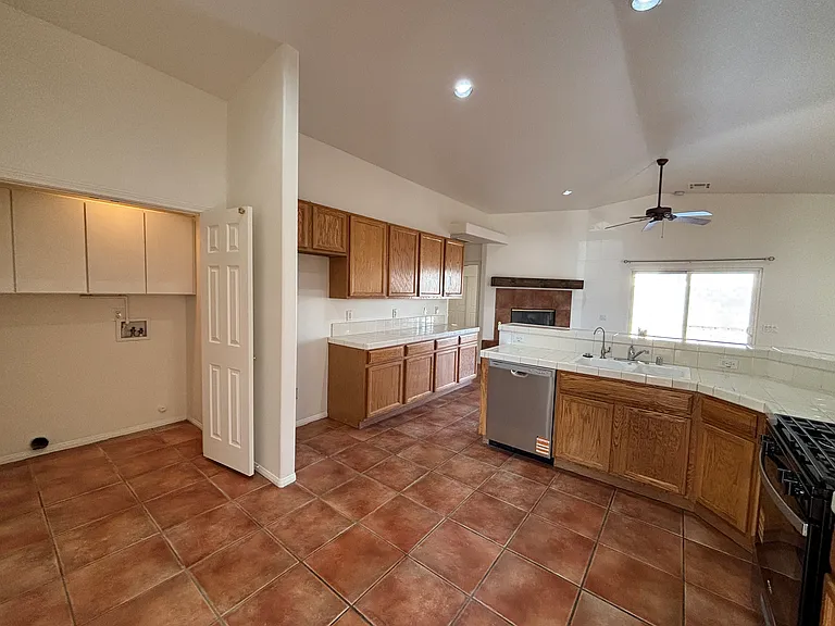 Convenient indoor laundry hookups located just off the kitchen, with easy access to the main living area.