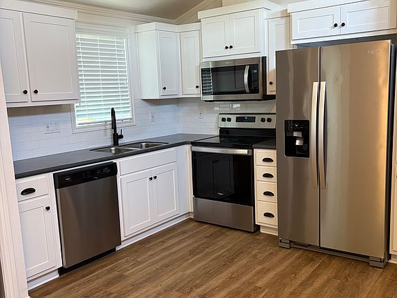Kitchen with full-size appliances and plenty of storage