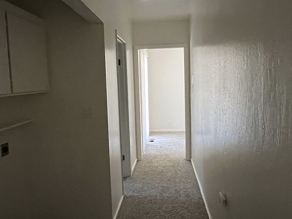 Hall leading back to dining room.