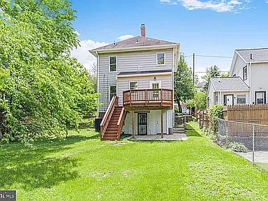 Large, fully fenced backyard