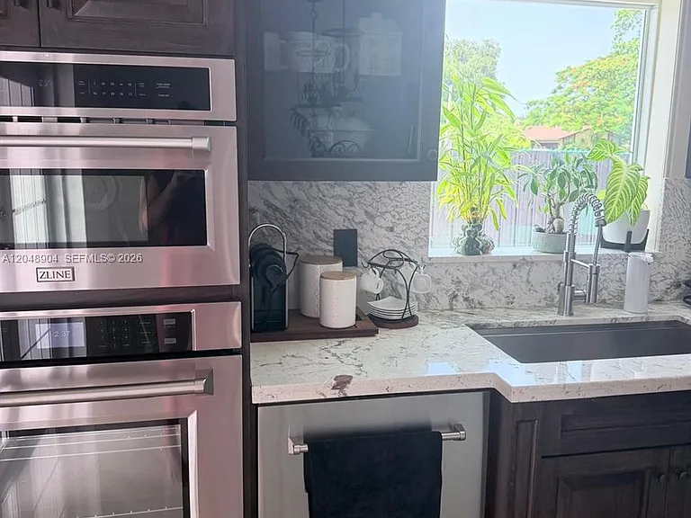 9211 NW 32nd Pl — Photo 8
