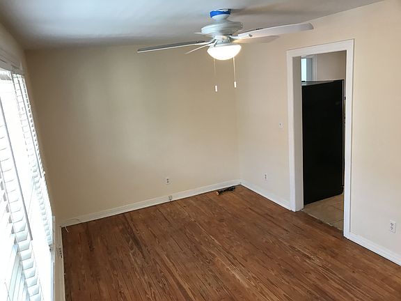 View of living room looking back at the kitchen.