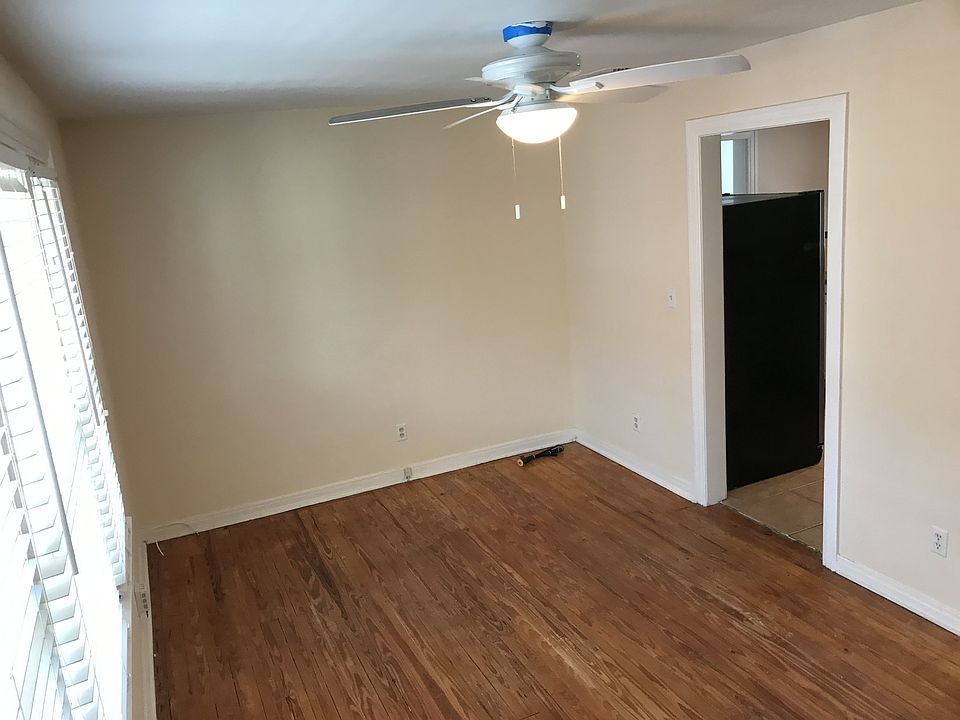 View of living room looking back at the kitchen.