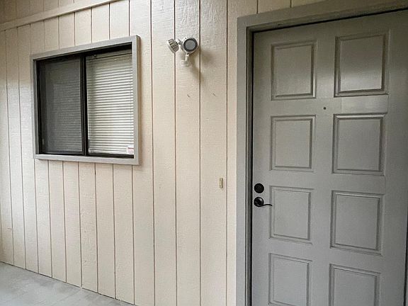 Front door with enclosed covered entrance
