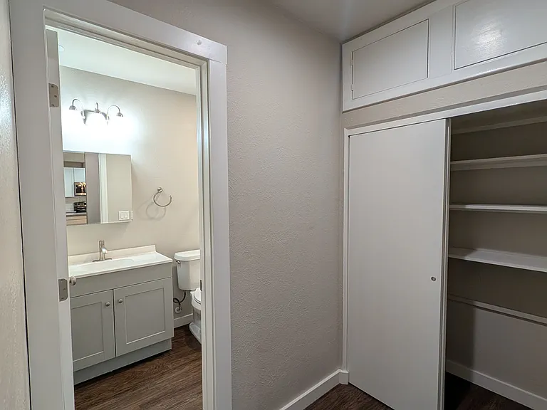 Hallway closet with additional storage