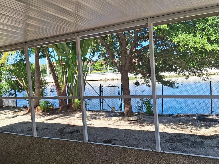 Porch facing backyard and lake view