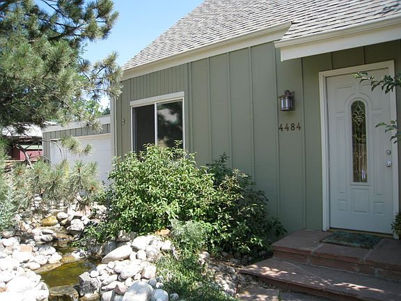 Stream in front of house