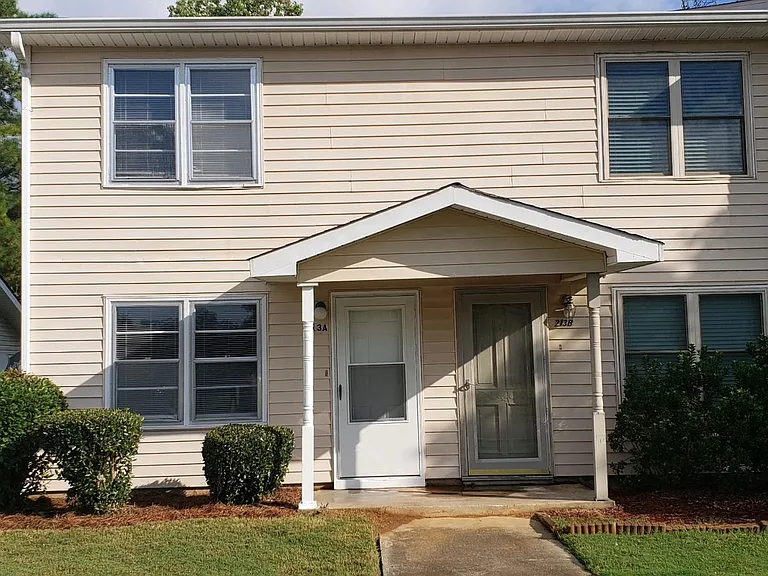 Front View of the entire Condo/Duplex. Our property on the left! Well maintained at all times! No excess yard objects.