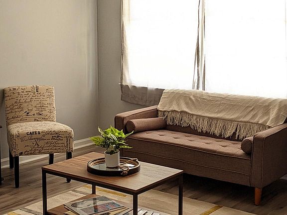 Spend nice evenings unwinding in the living room while enjoying a good book or a little television.