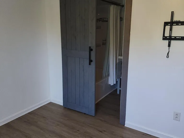 1of 2 bedrooms with master bathroom