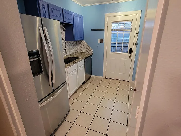 Updated kitchen with new dishwasher. Stainless steel.
