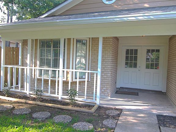 Greet your guest at this lovely front porch.