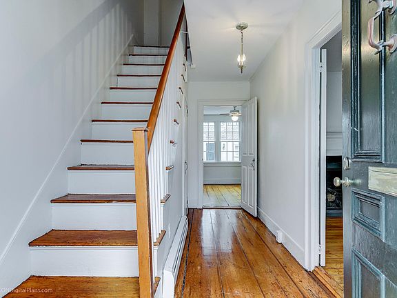Entry. Refinished wide board pine floors. Lvrm to the right. TV/Dining room straight ahead