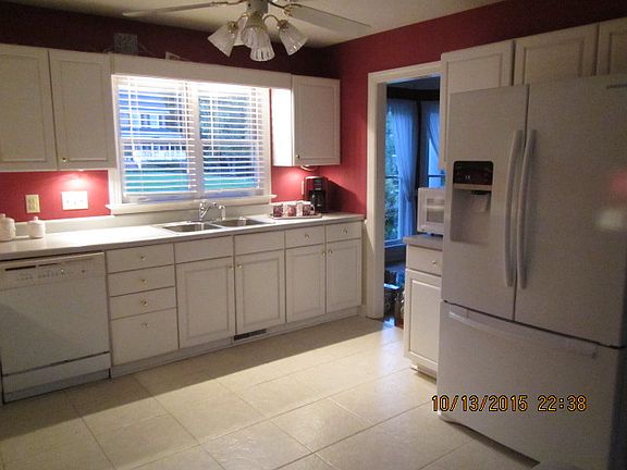 Kitchen with refrigerator