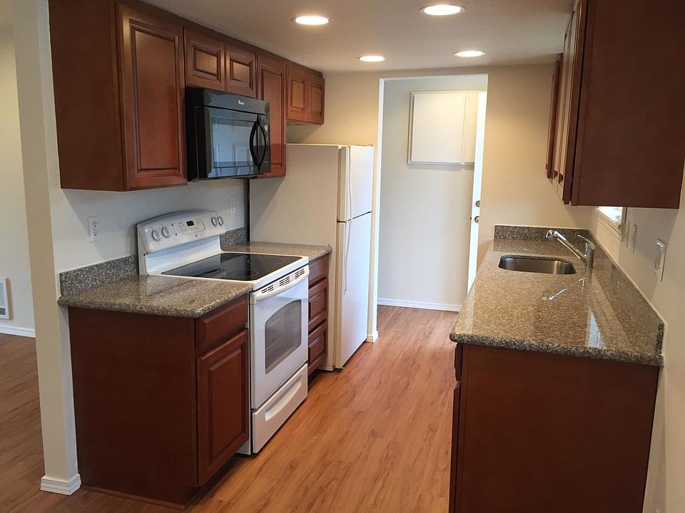 Custom Kitchen with wood cabinets and granite counter-tops