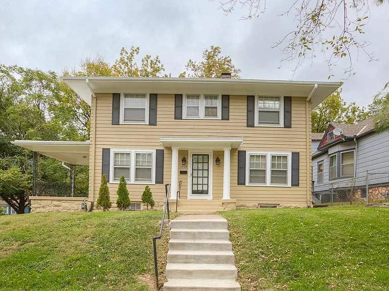 This Colonial Style house sits on the Corner of 40th and Bell Streets.
