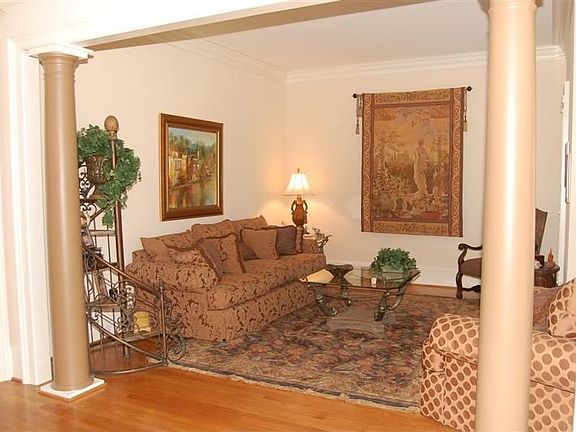 Roman columns define the entrance to the formal living room 