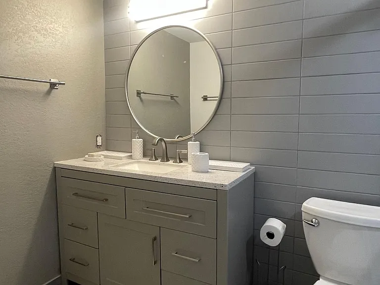 Upstairs bathroom. Modern design, neutral, calming.
