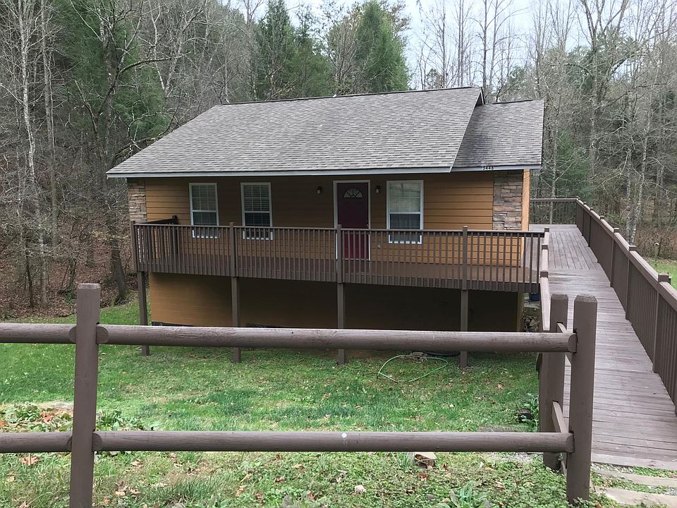 Front of home. 3/4 walk around deck