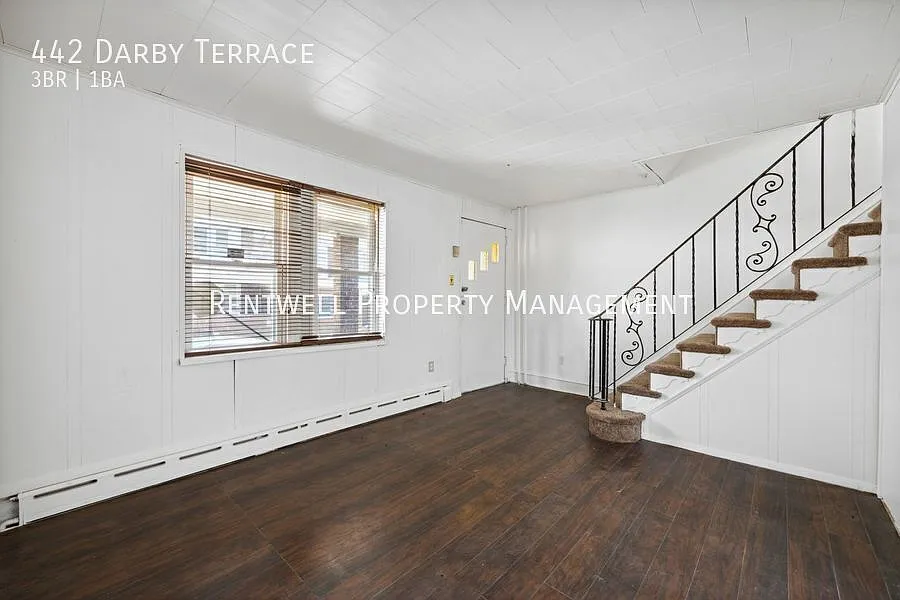 Updated 3-Bedroom End-Unit Home with Covered Porch & Patio — Photo 4