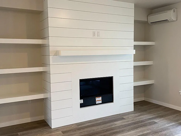 Gas Fire Place, Built in Book Shelves, Air Conditioning