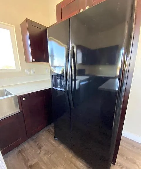 Refrigerator with ice maker and water in the door
