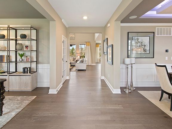 Foyer with hardwood floor