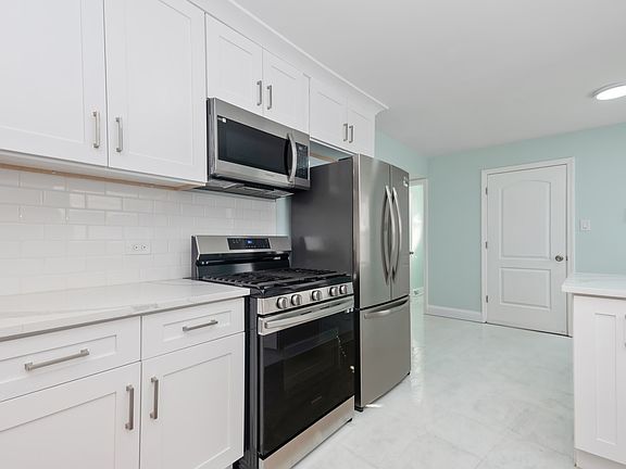 5th image of 9015 S Essex Ave