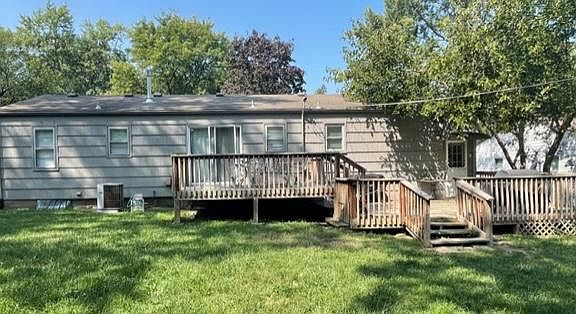 Large two level deck with house access from laundry room and from garage.