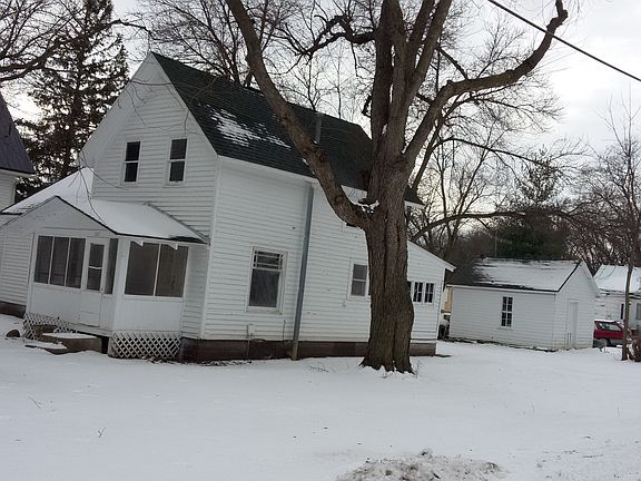 Front of the House and Detached Shed