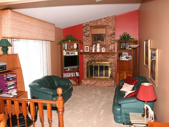 Family Room with Skylight & Brick Fireplace