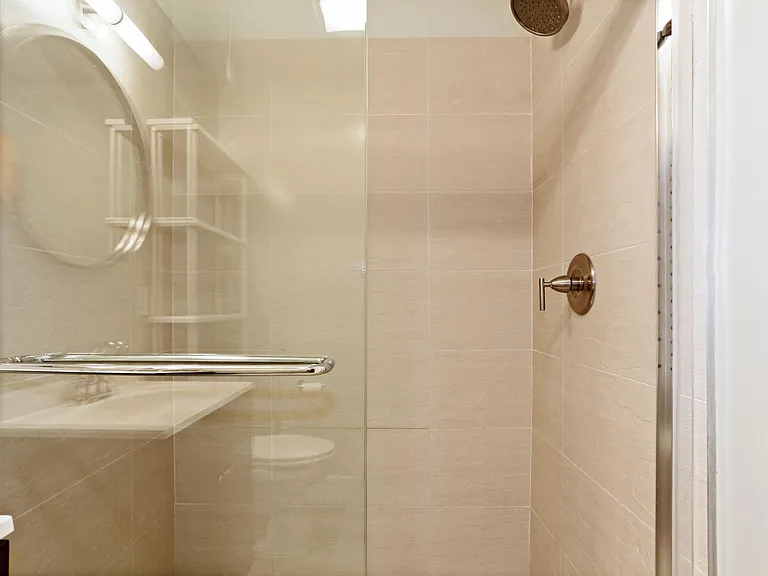 Spacious Shower with glass panels