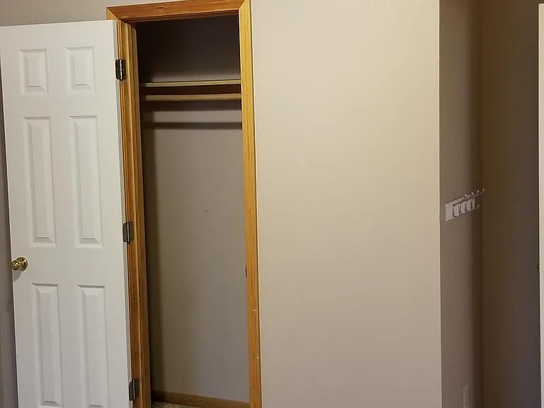 Bedroom #2 - Closet and ceiling fan.