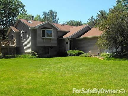 Front of house and 2+ garage