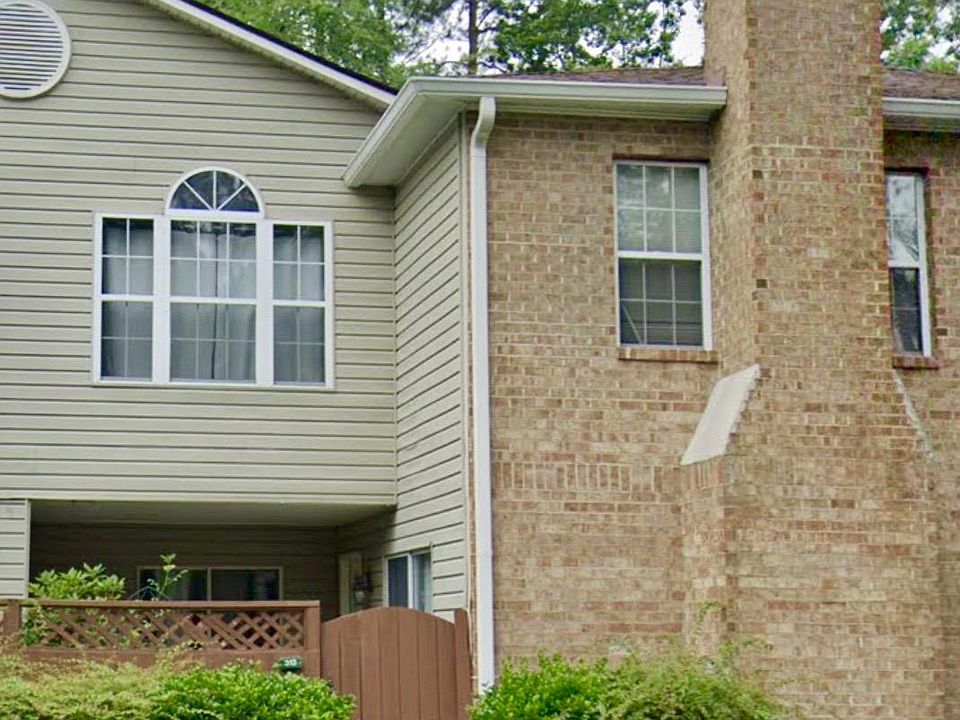 Two-story condo in a great community with on-site parking, pool and close access to the express busline.
