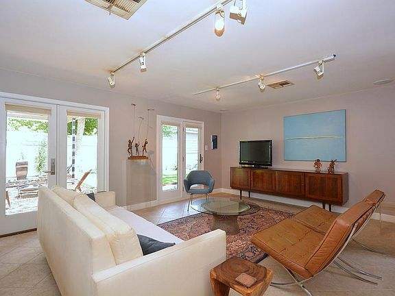 19x16 Family Room with French Doors overlooking gorgeous backyard.