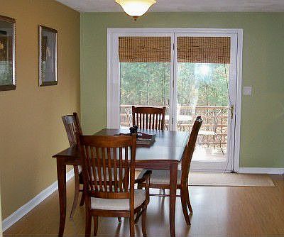 Dining area with atrium doors to private deck