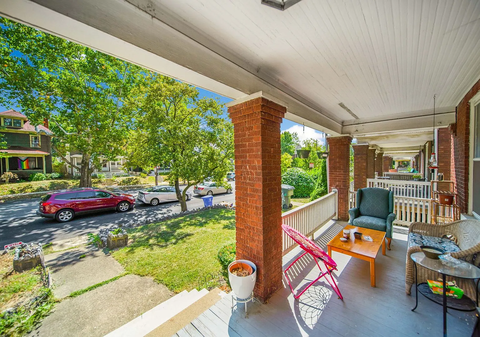 Charming 5-Bedroom Home with Exposed Brick and Modern Upgrades — Photo 4