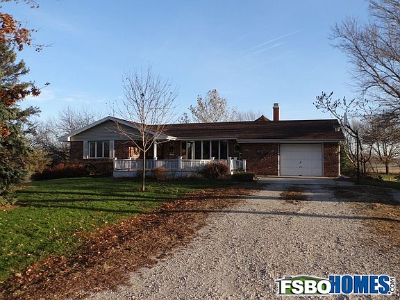 Front of Main Home W/ Large Front Porch,One Garage (Addit. 2 Car Gar.Next to Home)