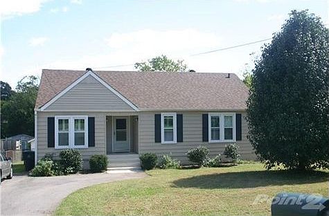 Notice the low maintenance siding and new roof and new energy efficient windows. Beautiful magnolia 