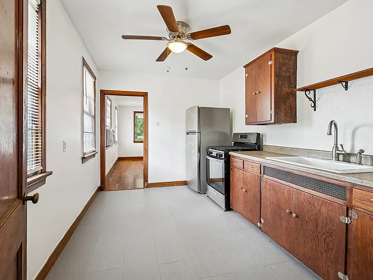 Kitchen with new stove & fridge