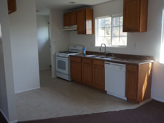 Kitchen with laundry area