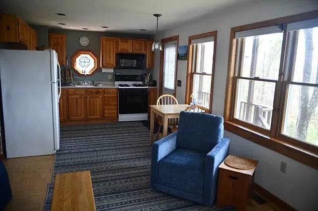 Open kitchen/ living room. - 321 Christian Hill Rd