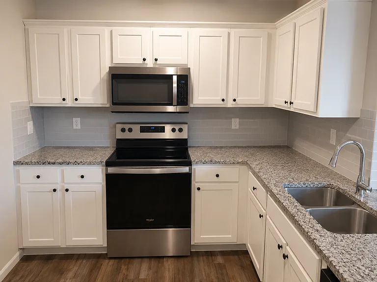 Kitchen with granite and all stainless steel appliances