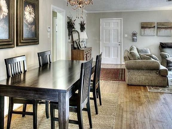 Flexible living and dining space with multiple configuration options.