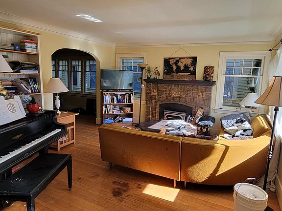 living room with the front door on your right